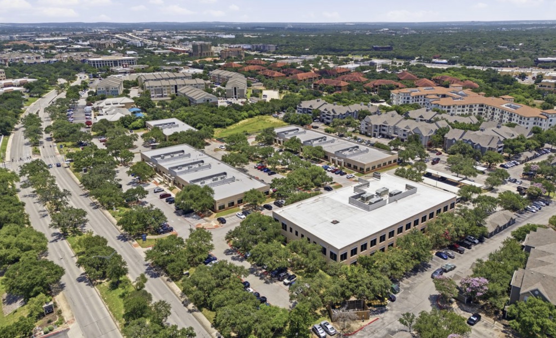 Four-building campus along Sonterra Boulevard.